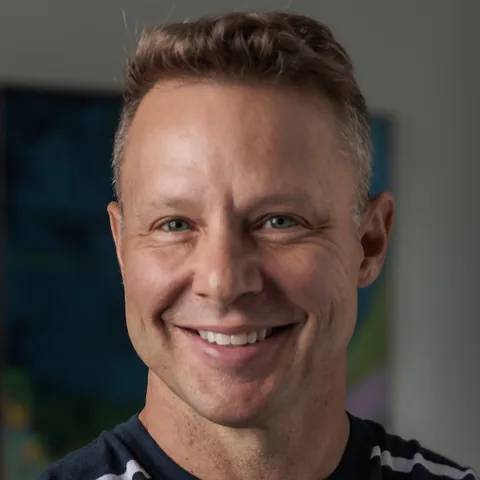 Robb Green smiling at the camera